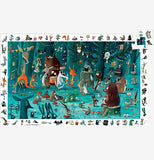 A picture of the puzzle with the corner piece being magically put in without a hand. Forest creatures are partying in the woods, and an "I spy" border surrounds the puzzle.