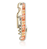 This corkscrew is covered with a design of pink and orange flowers down its handle.