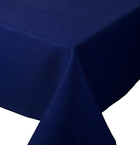 This indigo tablecloth is shown folded at the end of the table.