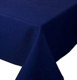 This indigo blue tablecloth is shown folded at the end of the table.