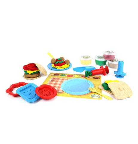 The Meal Maker Dough Set has 18 piece toy set, including 1 spaghetti extruder, 1 flat extruder, 1 knife, 1 cheese stamp, 1 tomato stamp, and 1 sauce cutter. 