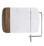 The white and brown cutting board with the wire cutter is shown from a downward looking angle.