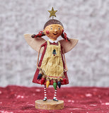 The angel girl figurine holding the lights is shown standing on a red shelf in front of a white wall.