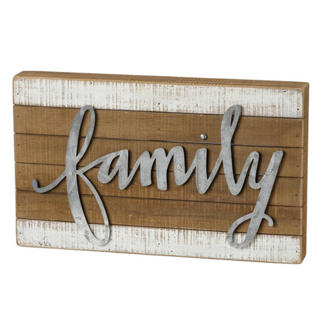 This wooden block features the word "Family" stenciled in steel and attached to the wood.