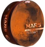 A round, circular puzzle package. There is a picture of Mars on it.