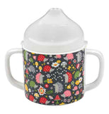 This sipping cup has hedgehogs and flowers on it and is black with a white top and white handles.