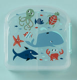 Blue sandwich box has sea animals on it.