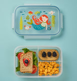 Isla the mermaid bento box with lid off laying above box with sandwich, cracker, and gold fish crackers on a blue table. 