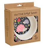 The black and white bowl with the flower and hedghog pictures is shown inside its cardboard box. The words, "Suction Baby Bowl" are shown at the top of the box in black lettering.