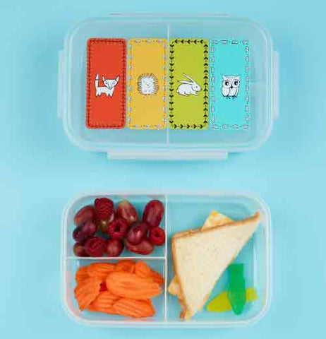 Meadow friends bento box laying open with a prepared lunch already in it.
