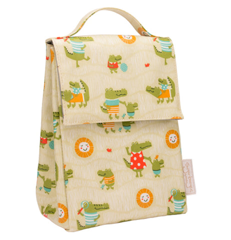 This cream colored lunch sack is shown with a design of differently dressed alligators covering it.