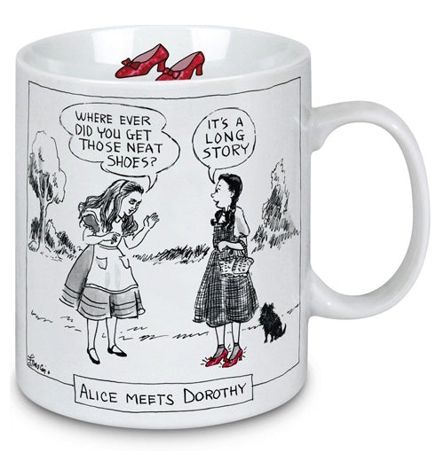 This white mug features an image of Alice from "Alice in Wonderland" meeting Dorothy and her dog Toto from "The Wizard of Oz". Below the rim, inside the cup, is a picture of the ruby slippers.