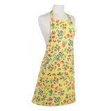 This yellow apron has strawberries and black berries on it.
