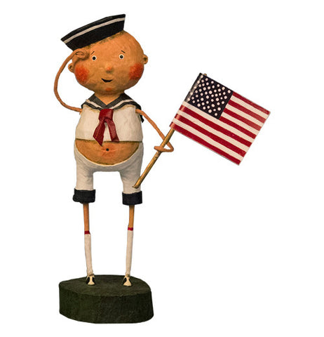 This figurine is of a man wearing a Naval Sailor's hat and uniform and holding an American flag.