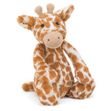 orange and cream colored plush giraffe front view