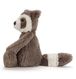 The brown raccoon toy with the white face and ring tail is shown here on a side view.