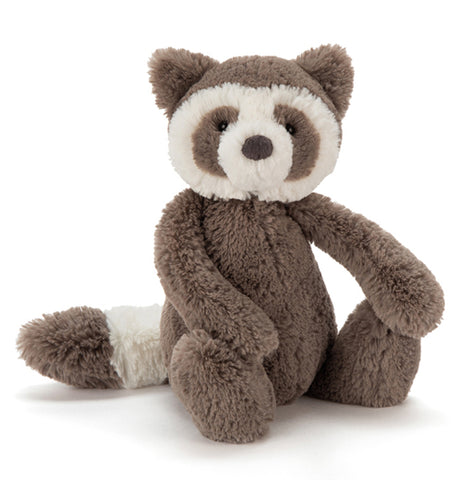 This brown and white stuffed raccoon is shown in detail from the eye patches on the face down to the white ring around the tail.