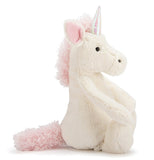The Bashful Medium sized Unicorn sits on the left side with pink hair, pink ears, and a pink tail. 
