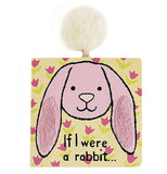This book is yellow with a pink floppy ear rabbit on the front that has textured furry ears. It says " If I were a rabbit".