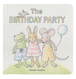 A paperboard book is titled "The Birthday party". A white bird is on the "T" in birthday. An anthropomorphized frog, rabbit, and mouse are posing with their arms around each other. The mouse is holding a blue ballon. 