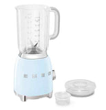 A blender with a pastel blue base is on its' base. The top is beside the blender, and taken apart to reveal that it's actually two pieces.