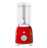 A blender with a red base is on its' base. The top is on. "Start/stop" and wifi buttons are visible.