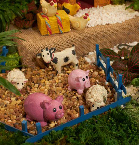 This mini blue fence panel is made for farm animal miniatures, such as pigs, sheep, and a cow. 