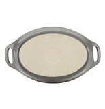 The "Gray" 1.5-quart Oval Baking Dish has the tan bottom. 
