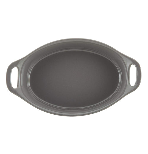 The "Gray" 1.5-quart Oval Baking Dish has the wide opening on the top. 