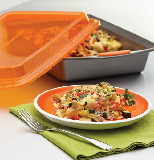The orange lid of the Covered "Oven Lovin&