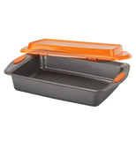 The orange lid opening the gray Covered "Oven Lovin" Baking Dish. 