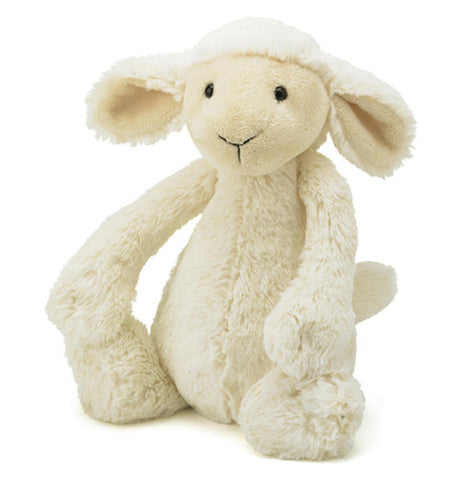 White plush lamb with cream colored face and ears