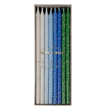 Set of 12 birthday candles in green, blue and white.