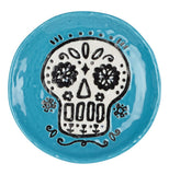 ceramic blue coaster with a white sugar skull