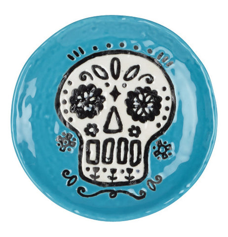 ceramic blue coaster with a white sugar skull
