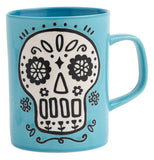 ceramic blue mug with white sugar skull
