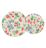 Large and small Berry Patch bowl covers next to each other with strawberry, blueberry, and raspberry vines stretched over bowls on a white background.