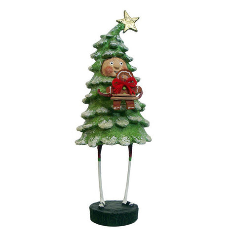 This figurine is of a person dressed like a spruce tree with a star on top, and holding a gingerbread man with a red ribbon around its neck.