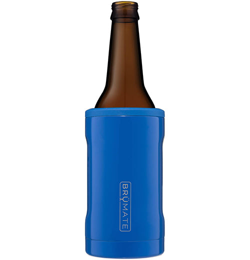 A dark blue/royal blue bottle cooler with a beer bottle in it.