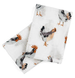 The two white burp cloths with multi-colored chickens are shown individually, one on top of the other.