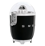 this black juicer shows its logo SMEG. The top is clear and shows the citrus grinder. There is a spout of the left side.