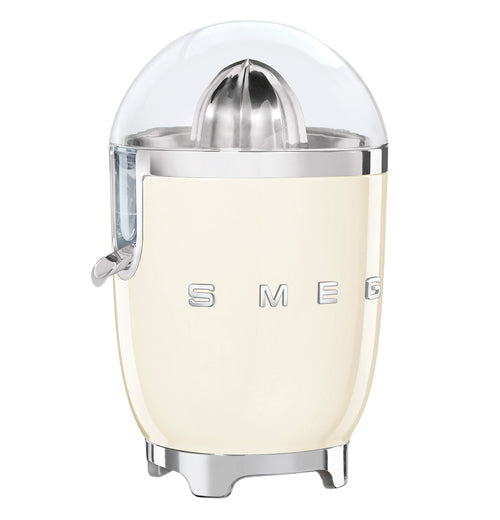 this cream juicer shows its logo SMEG. The top is clear and shows the citrus grinder. There is a spout of the left side.