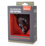 Black bear bottle opener in the package. 