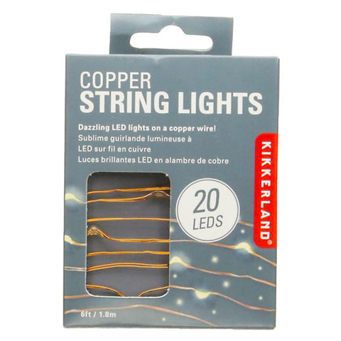 These lights, which are attached to small golden metal wires, are shown inside their gray box with the logo, "Kikkerland" on the side. 