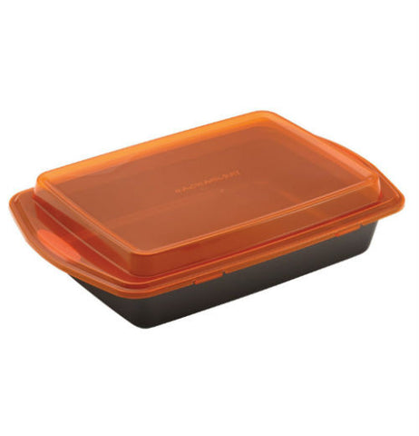 The gray Covered "Oven Lovin'" Baking Dish with an orange lid snapped onto it.
