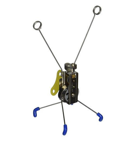 This little metal wind-up toy has a yellow wind-up handle on its back end, four legs underneath with blue socks on the feet, and two antennae on top.