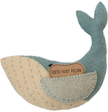 A blue and white felt whale has a pouch in its side fin. A piece of paper with the words "tooth fairy pillow" stick out.