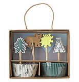 The "Let's Explore" Cupcake Kit features cupcake wrappers in 2 styles, one forest green the other white with forest green pine trees, plus 4 different toppers of a pine tree, a bear, a sun, and a teepee.