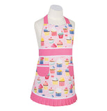 Pastel pink apron with colorful cupcakes all over it hanging on a white mannequin bust. Apron has two pink pockets below the pink waistband, a pink neck strap and pleats on the bottom.