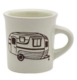 This is a diner inspired ceramic mug featuring a travel trailer design.